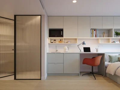 Modern bedroom with workspace and kitchenette